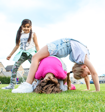 Wellbeing girls playing 353x378 1